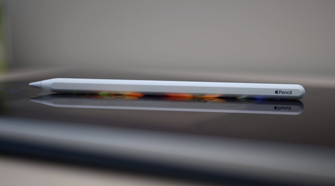 Apple Pencil 2 on glass tabletop