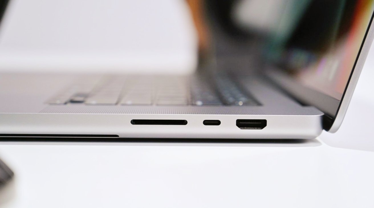 The new ports on the MacBook Pro include HDMI and an SD card slot.