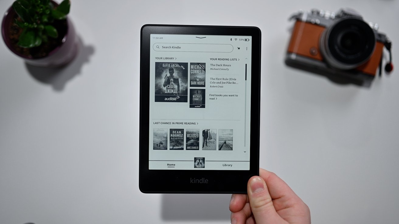 Kindle Paperwhite in hand