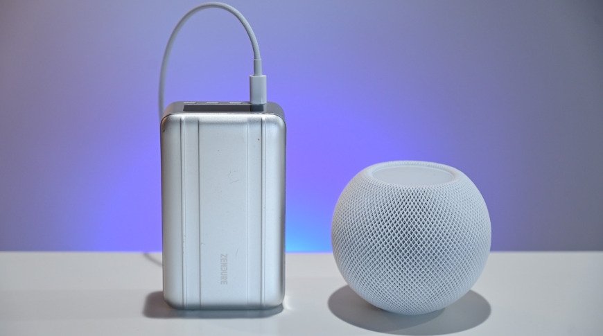 A HomePod mini and a USB-C battery pack.