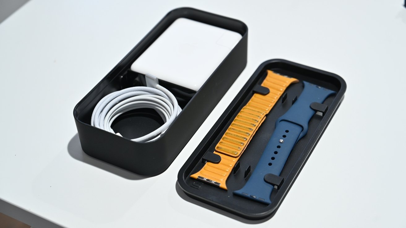 https://photos5.appleinsider.com/gallery/46637-90903-Charger-and-Watch-Bands-in-Bento-Stack-xl.jpg