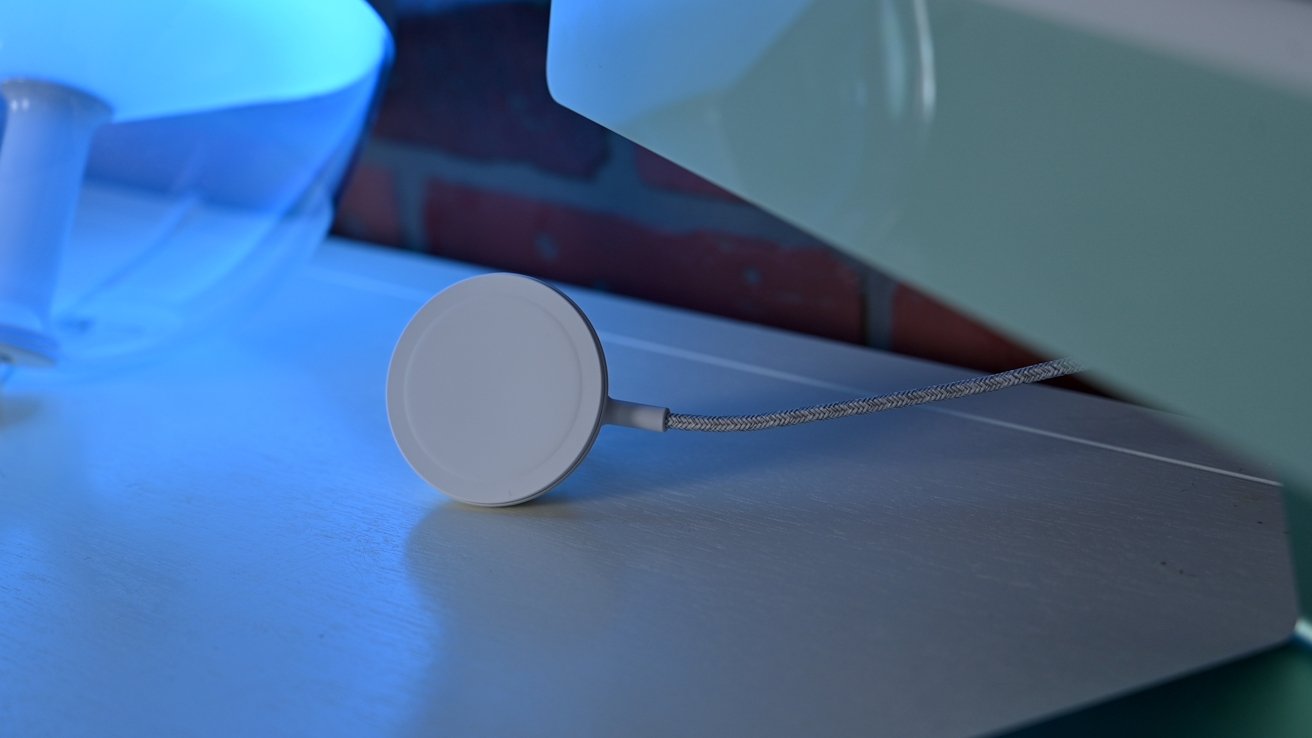 Belkin's Boost Charge Pro is a portable MagSafe wireless charging puck with  a built-in kickstand