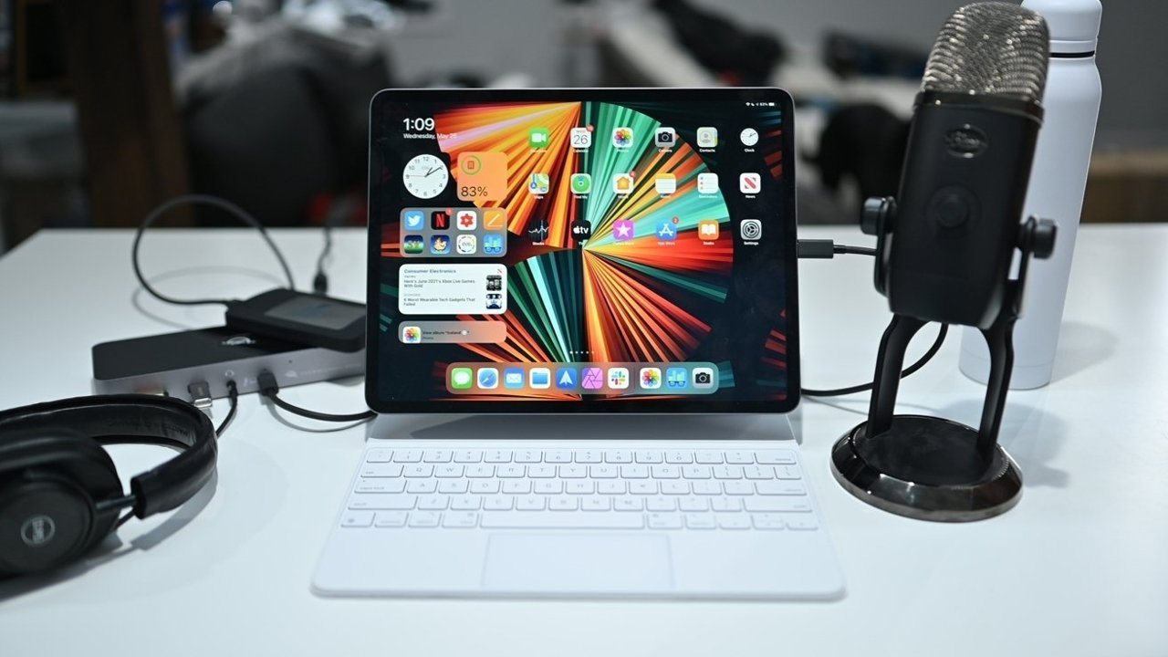 An iPad Pro with an attached keyboard. The rumor suggests the device could fold to better support a touchscreen keyboard.