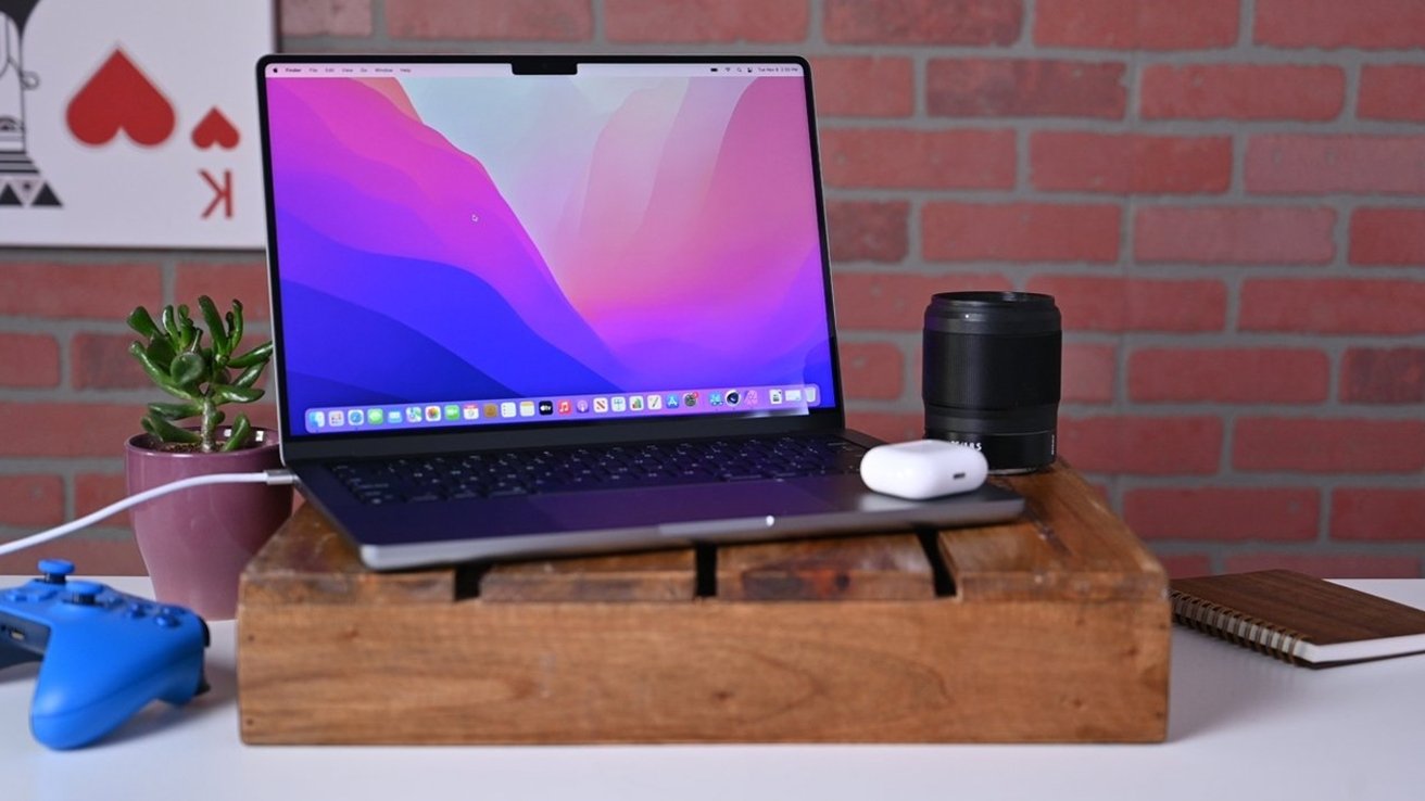 Apple 14-inch MacBook Pro on desk