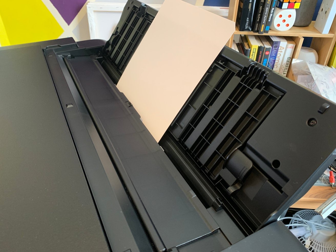 This printer is big and heavy, and can handle far more than typical A4 paper (A4 for scale)
