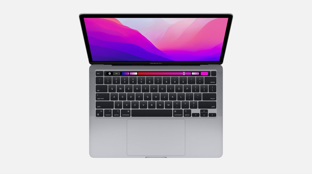 The 13-inch MacBook Pro keeps the Touch Bar for one more cycle. 