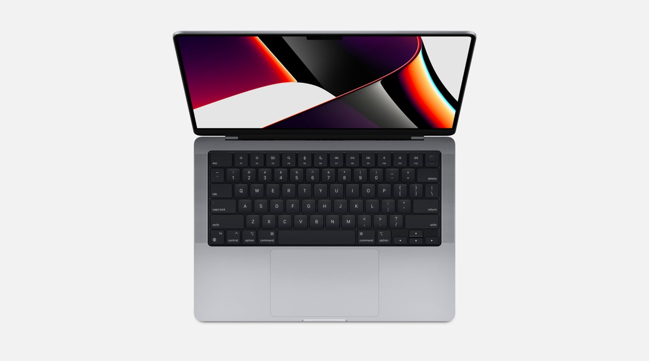 The 14-inch MacBook Pro has more keys for its keyboard, but it retains Touch ID. 