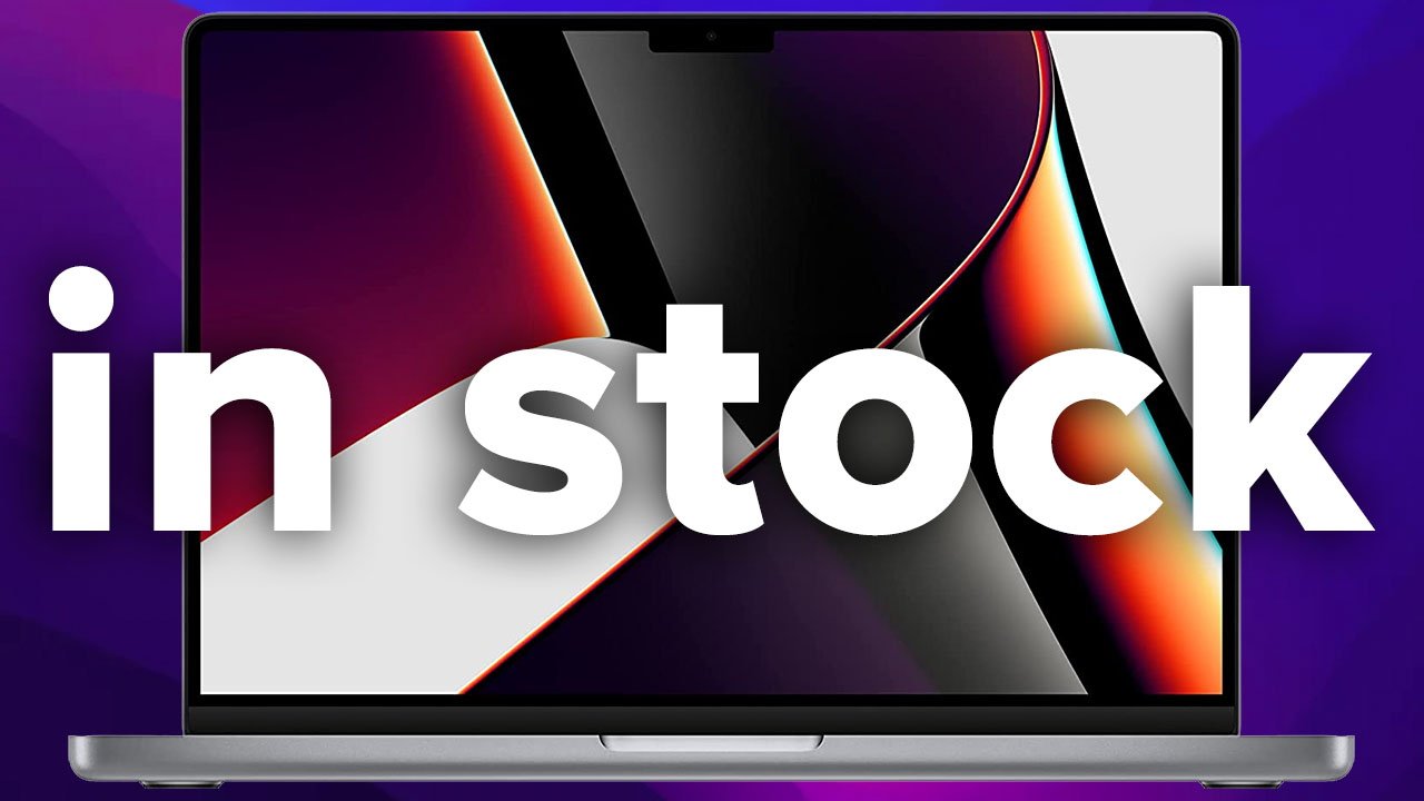 Apple MacBook Pro 14-inch in Space Gray with in stock text on purple background