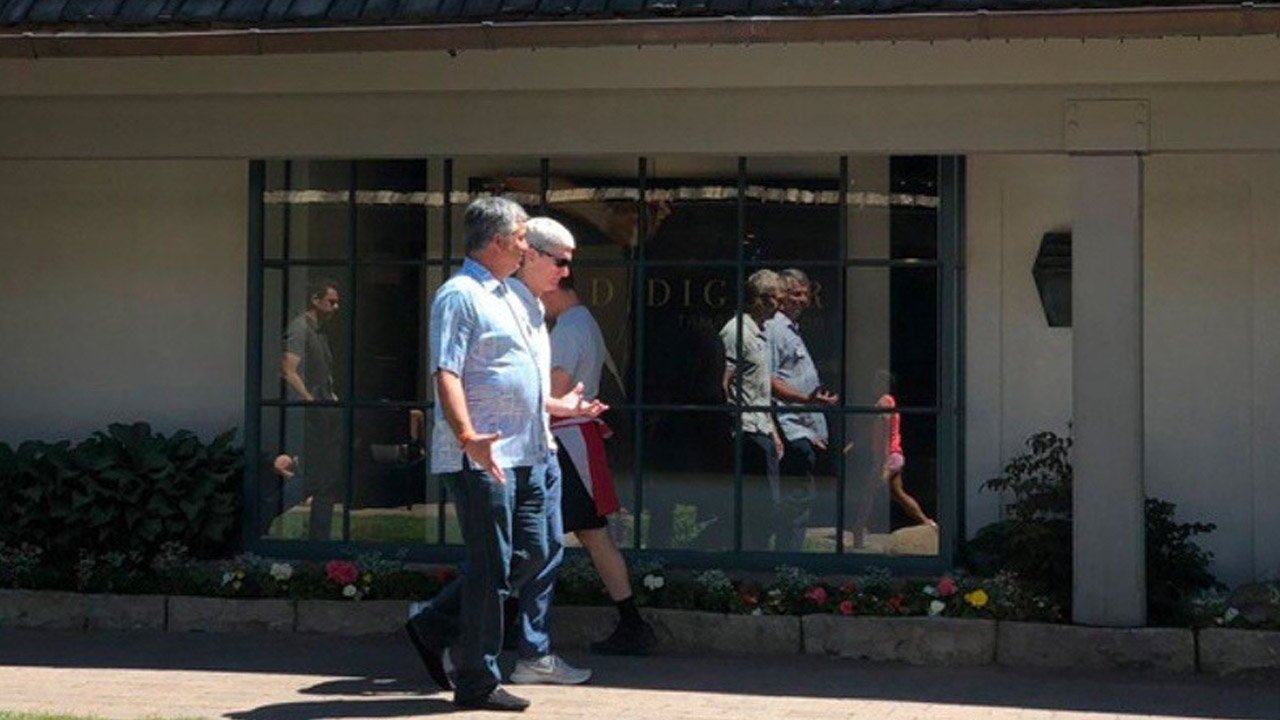 Eddy Cue and Tim Cook at a previous Sun Valley media retreat