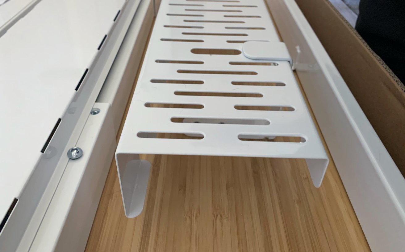 The supplied cable tray of the FlexiSpot Q8 Standing Desk is pretty good, and reasonably easy to install. 
