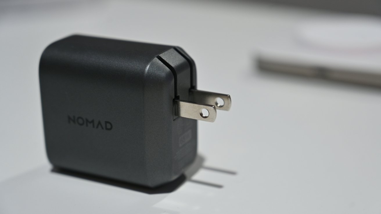 Nomad's 65W charger with folding prongs. 