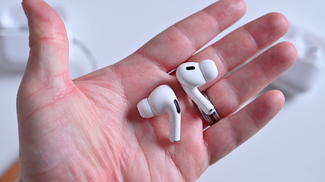 AirPods Pro in hand