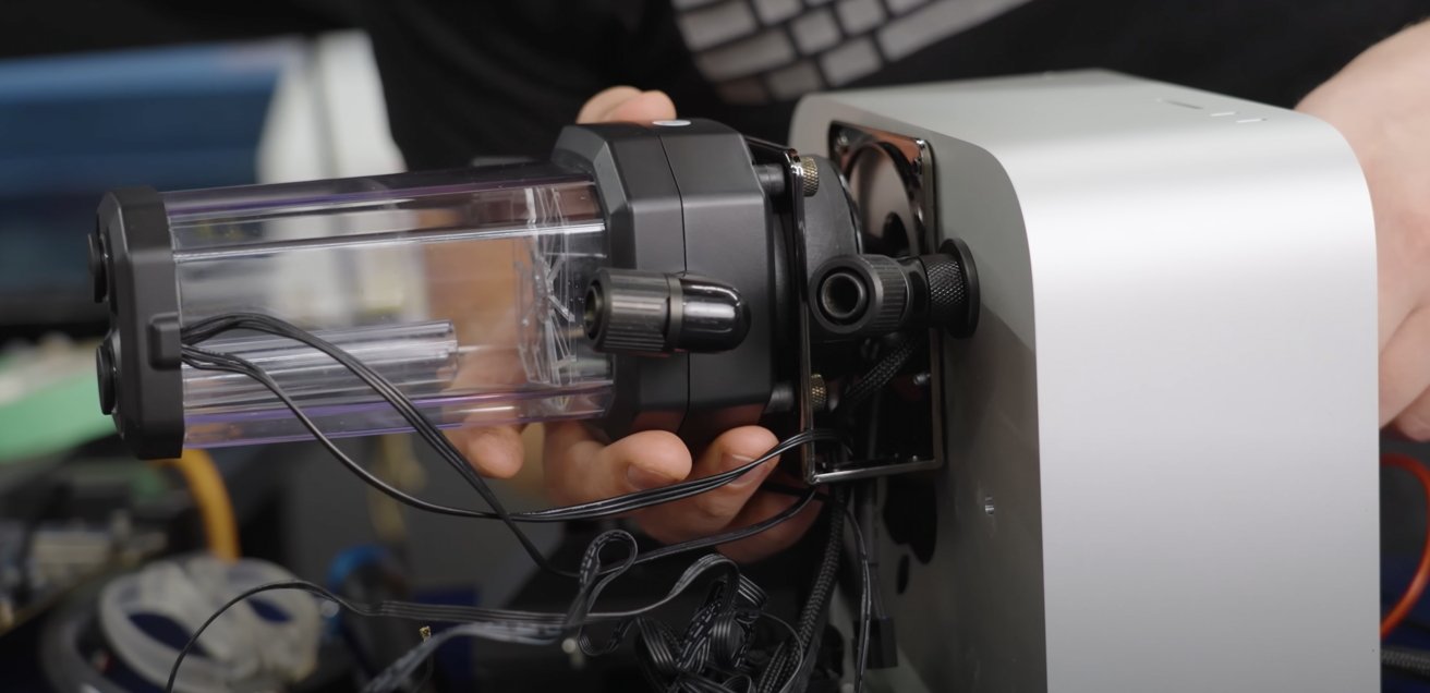 Holes were made through the Mac Studio's case for the water cooling system (via LinusTechTips)