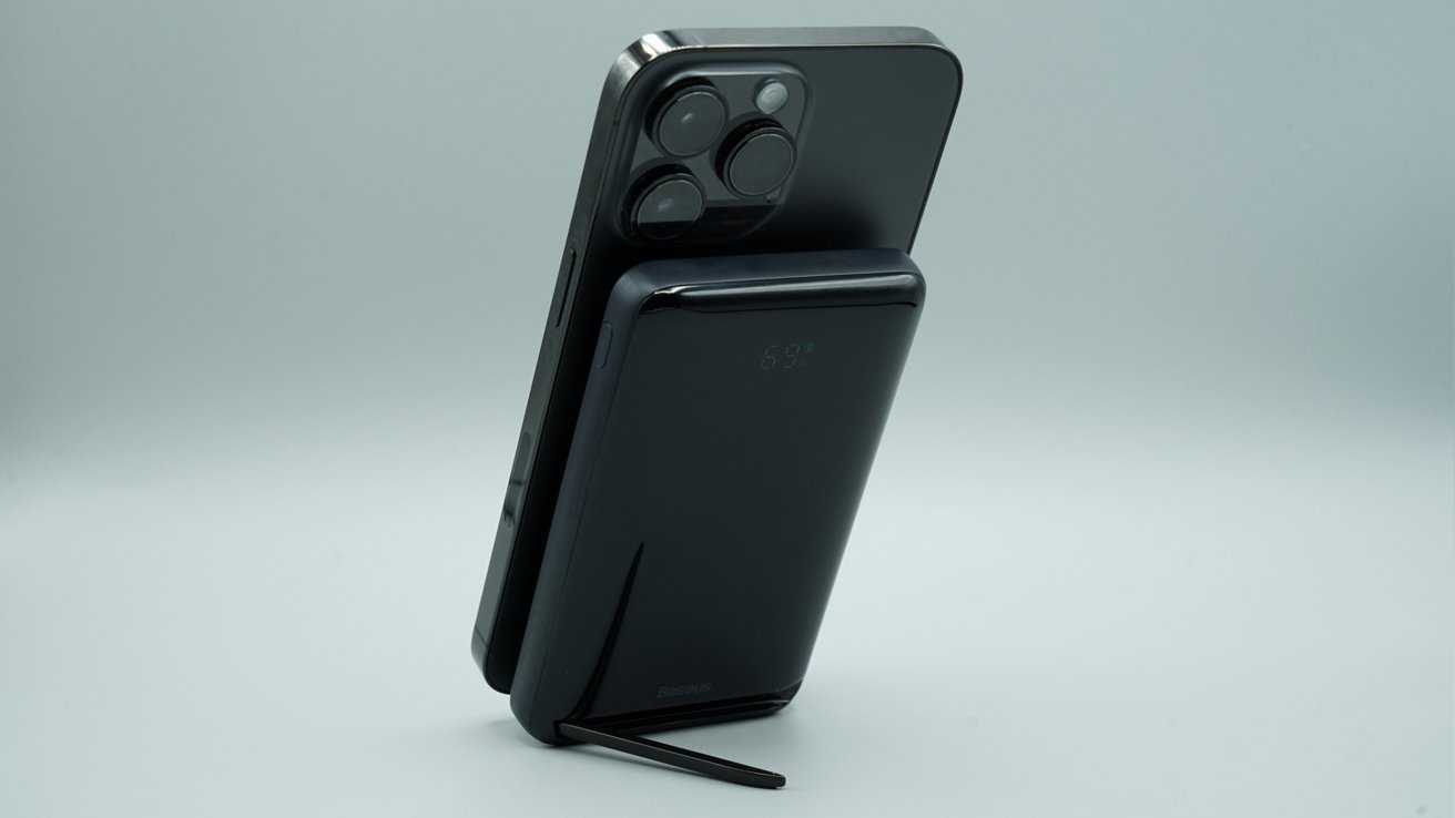 An integrated kickstand supports the iPhone when charging