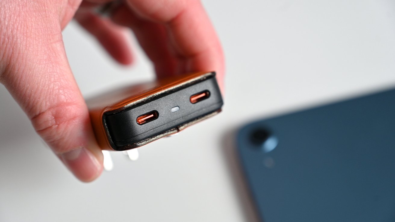 There are two USB-C ports in the base for charging. 