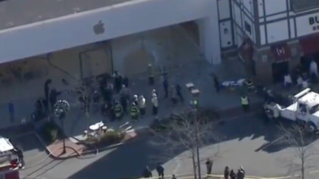 View of the Apple Derby Street store as first responders help. (Source: WCVB5)