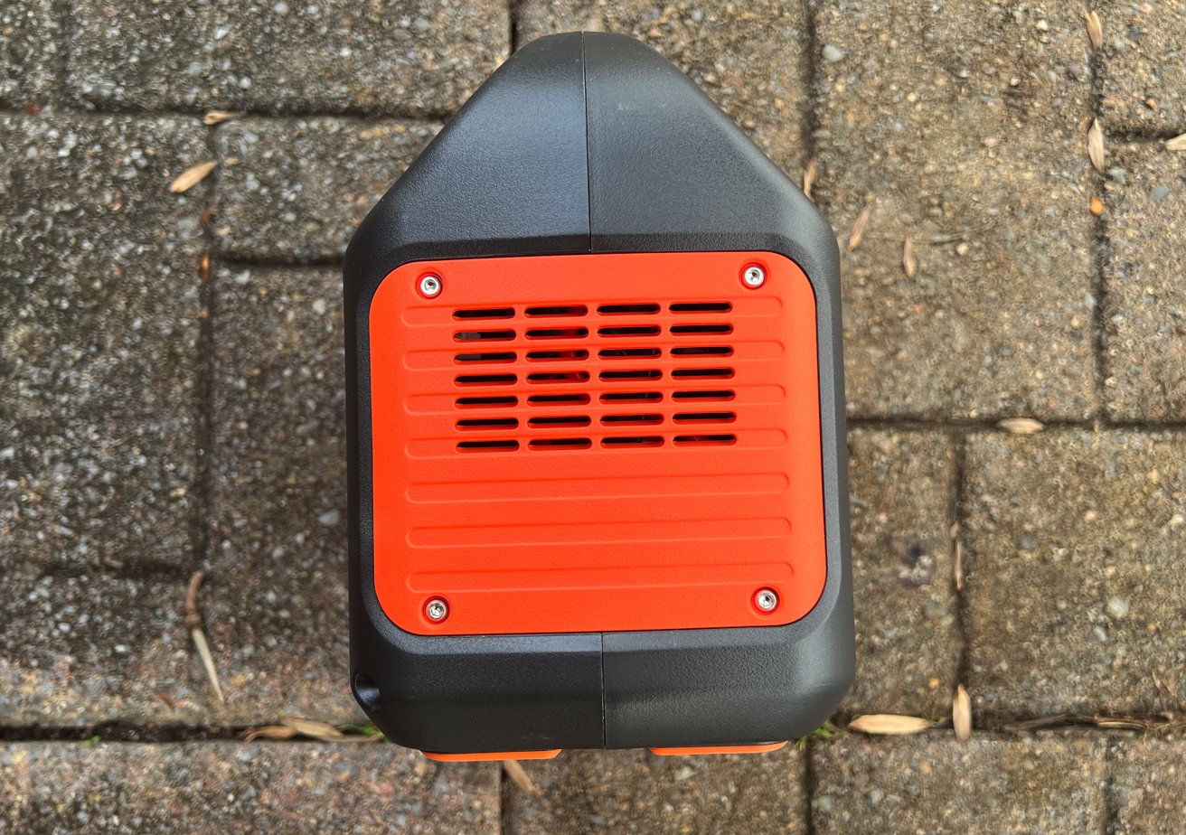 Behind the outside orange vents, is a fan to keep the interior cool