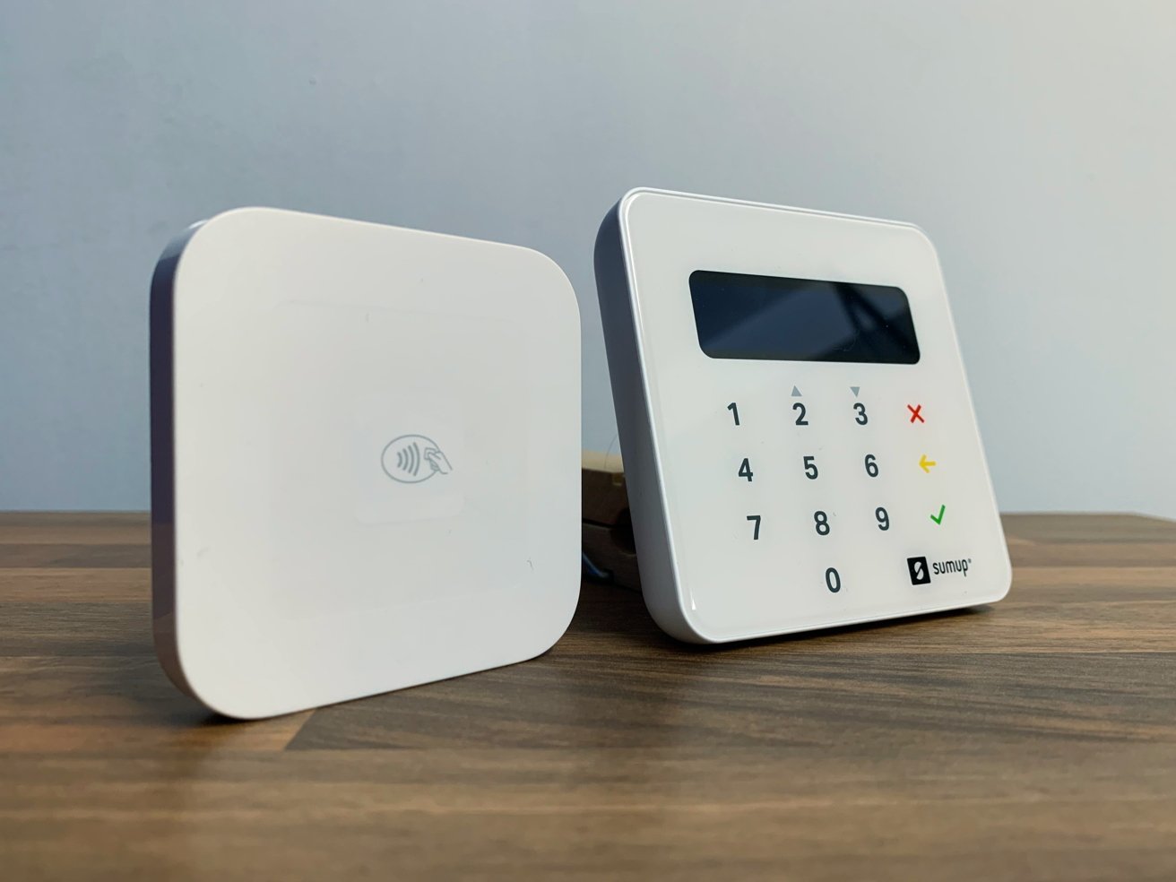 Card readers by Square (Left) and SumUp (right)