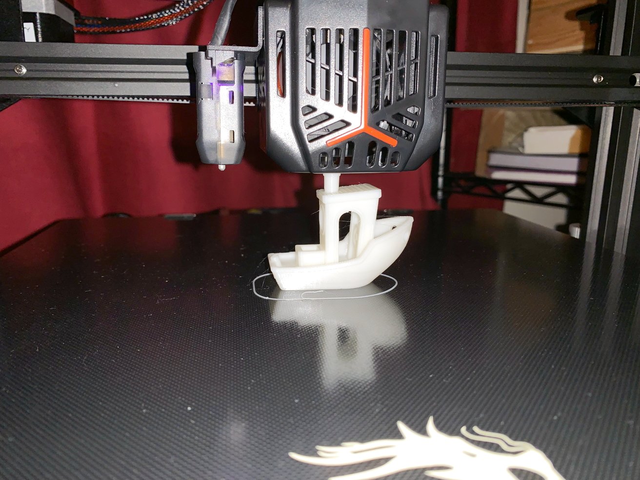 Printing 3DBenchie onto the textured glass build platform. Note the sensor used for the auto-level feature.