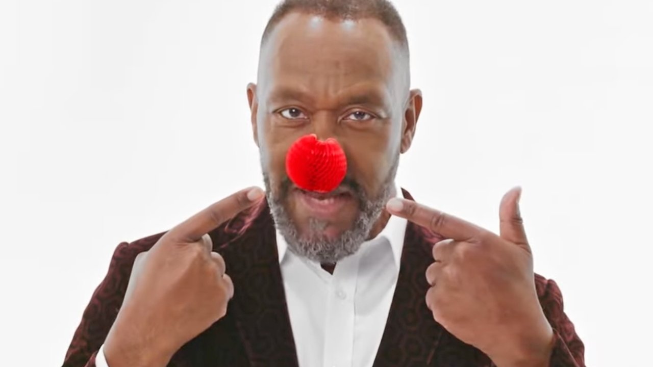 Sir Lenny Henry wearing the new Jony Ive-designed red nose for charity