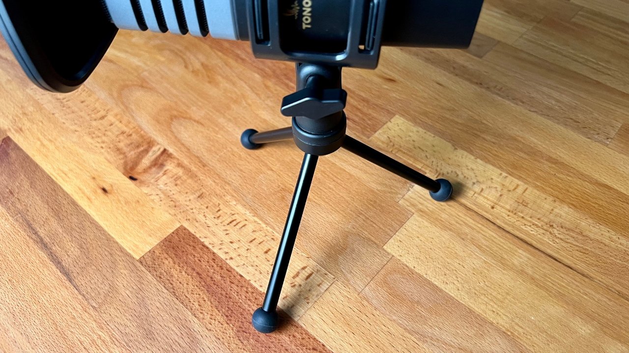 The Tonor TC30 comes with a tripod stand that houses a shock mount
