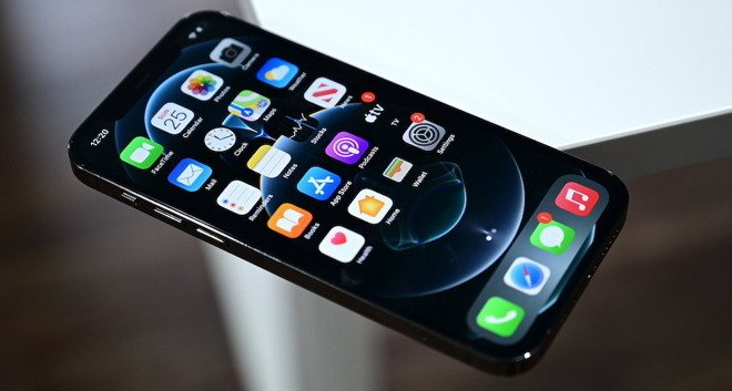 An iPhone with an OLED display.