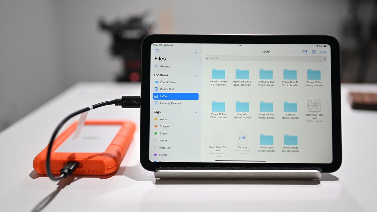 Save on storage ahead of World Backup Day | iPad Pro connected to LaCie Rugged External Hard Drive