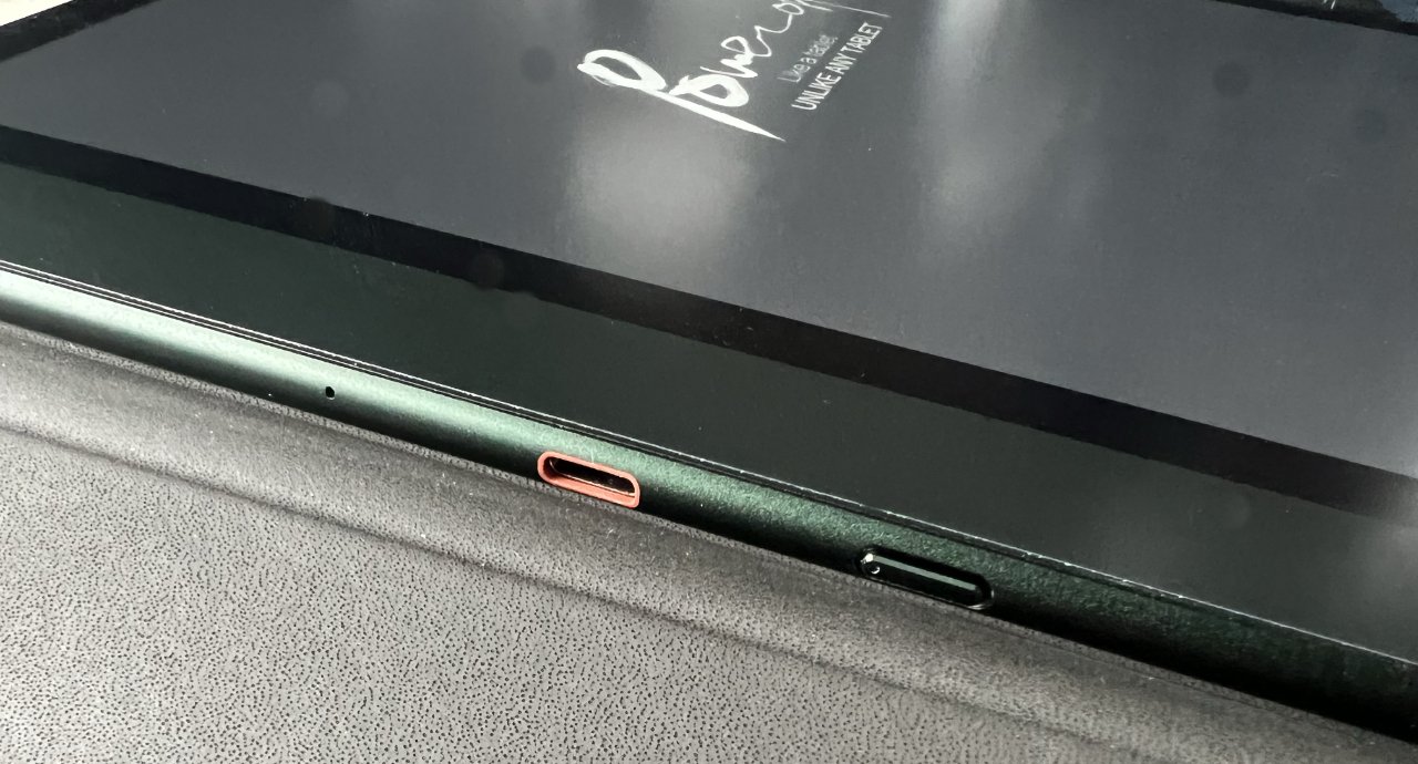 The USB-C charging port is blocked by the cover