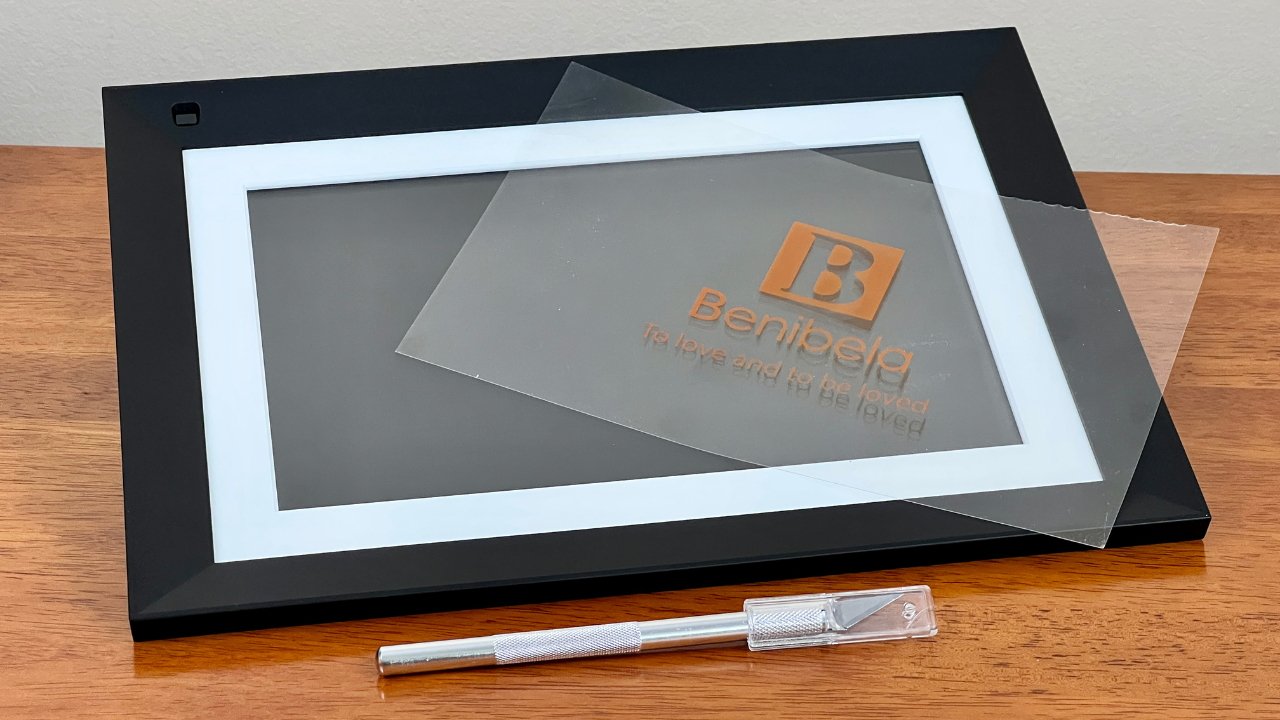 An X-Acto knife was required to carefully remove the screen protector from the Benibela digital picture frame 