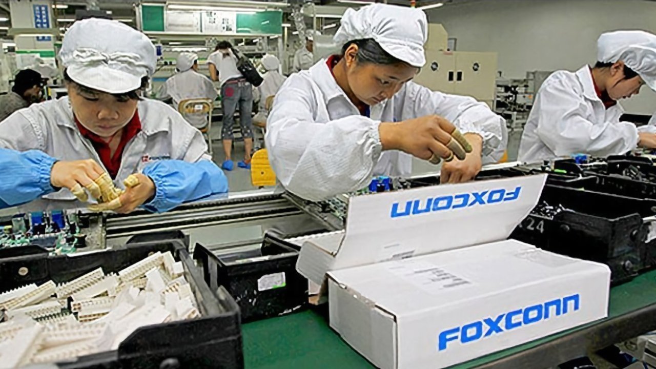 Workers on a Foxconn production line
