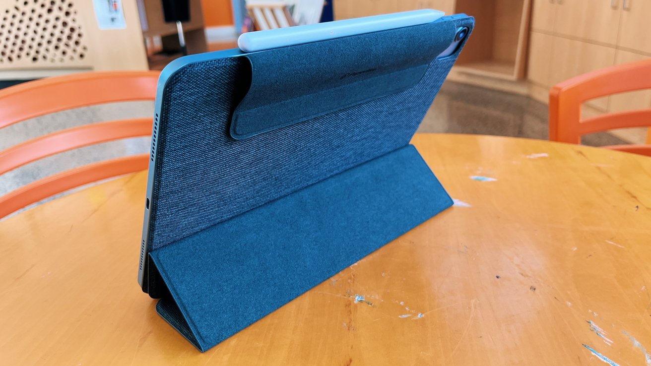 The pen flap is magnetic and can be secured to the back of the case when not in use