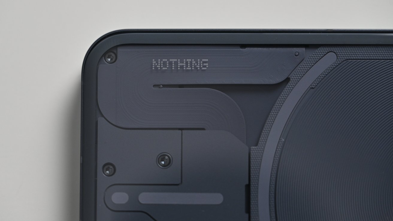 Nothing logo on the back of the transparent phone