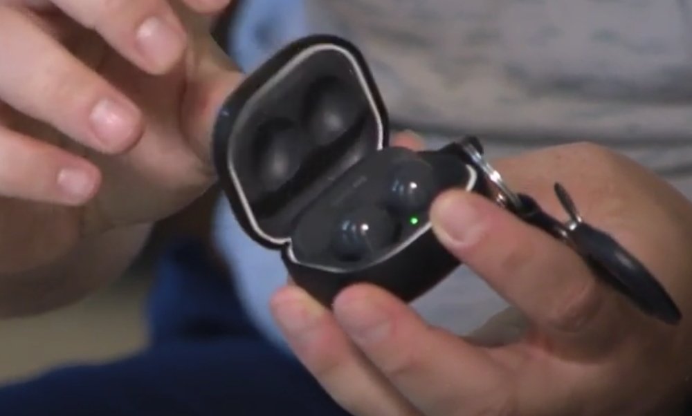 Krantz shows his headphones case and the attached AirTag holder (Source: WRAL-TV)