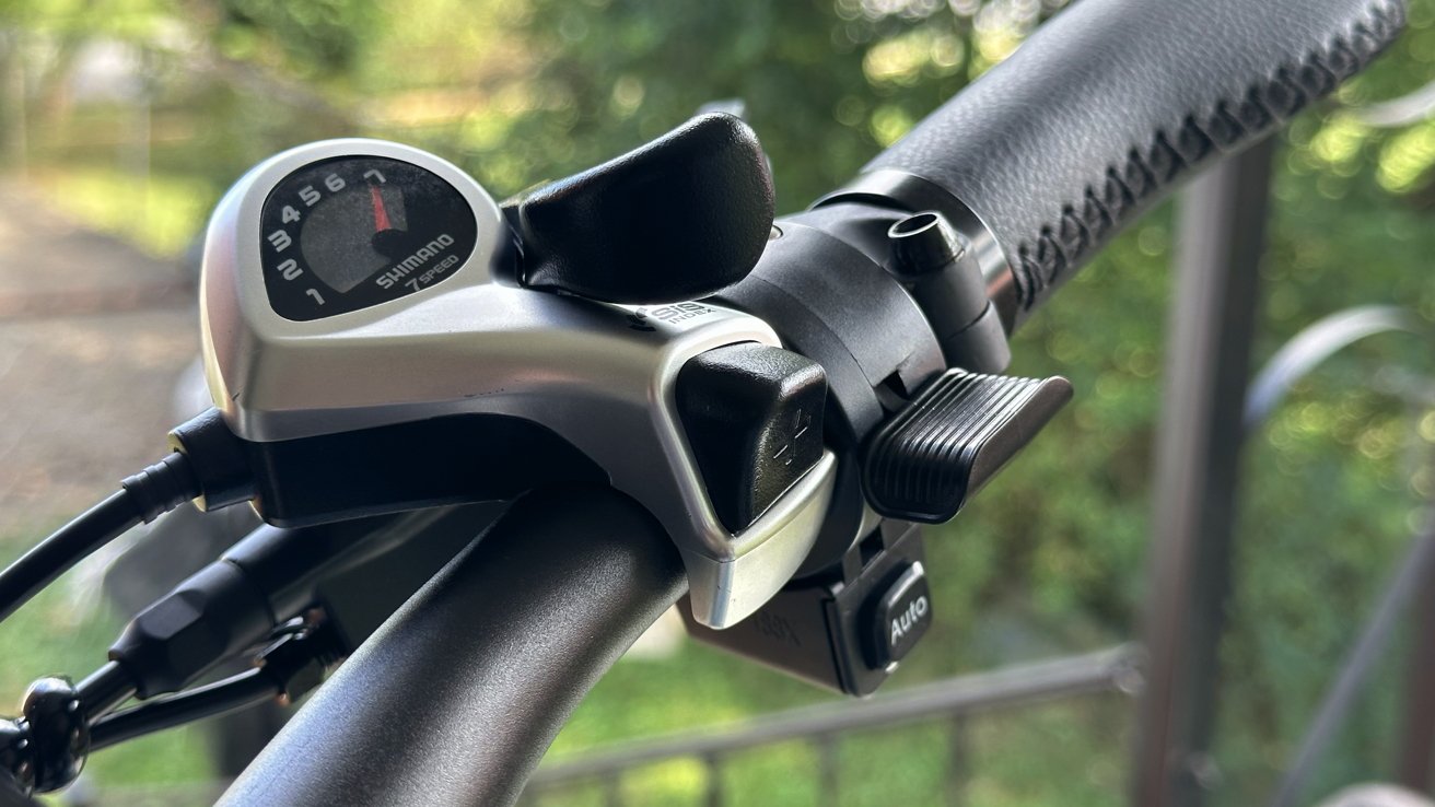 A Shimano shifter, throttle, and automatic light control button