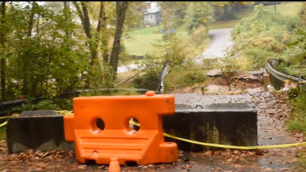 The collapsed Snow Creek bridge has now been barricaded. (Source; Hickory Daily Record)