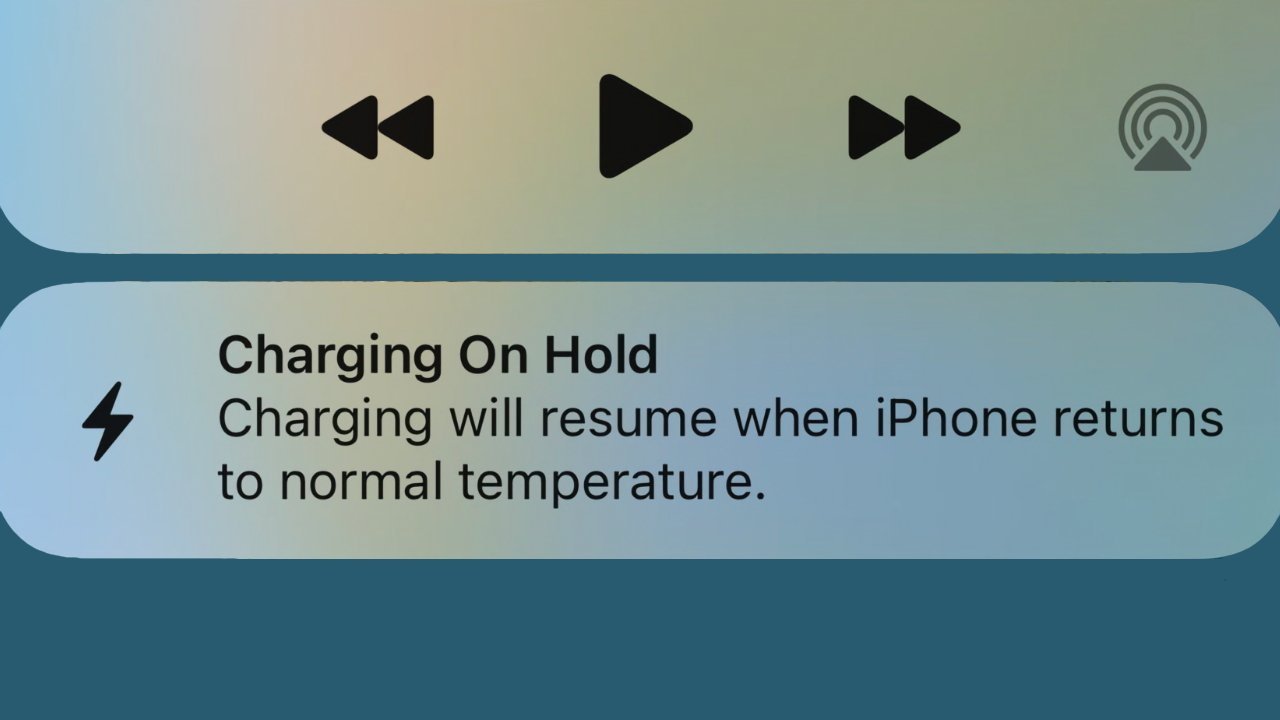 A Charging on Hold notice on an iPhone