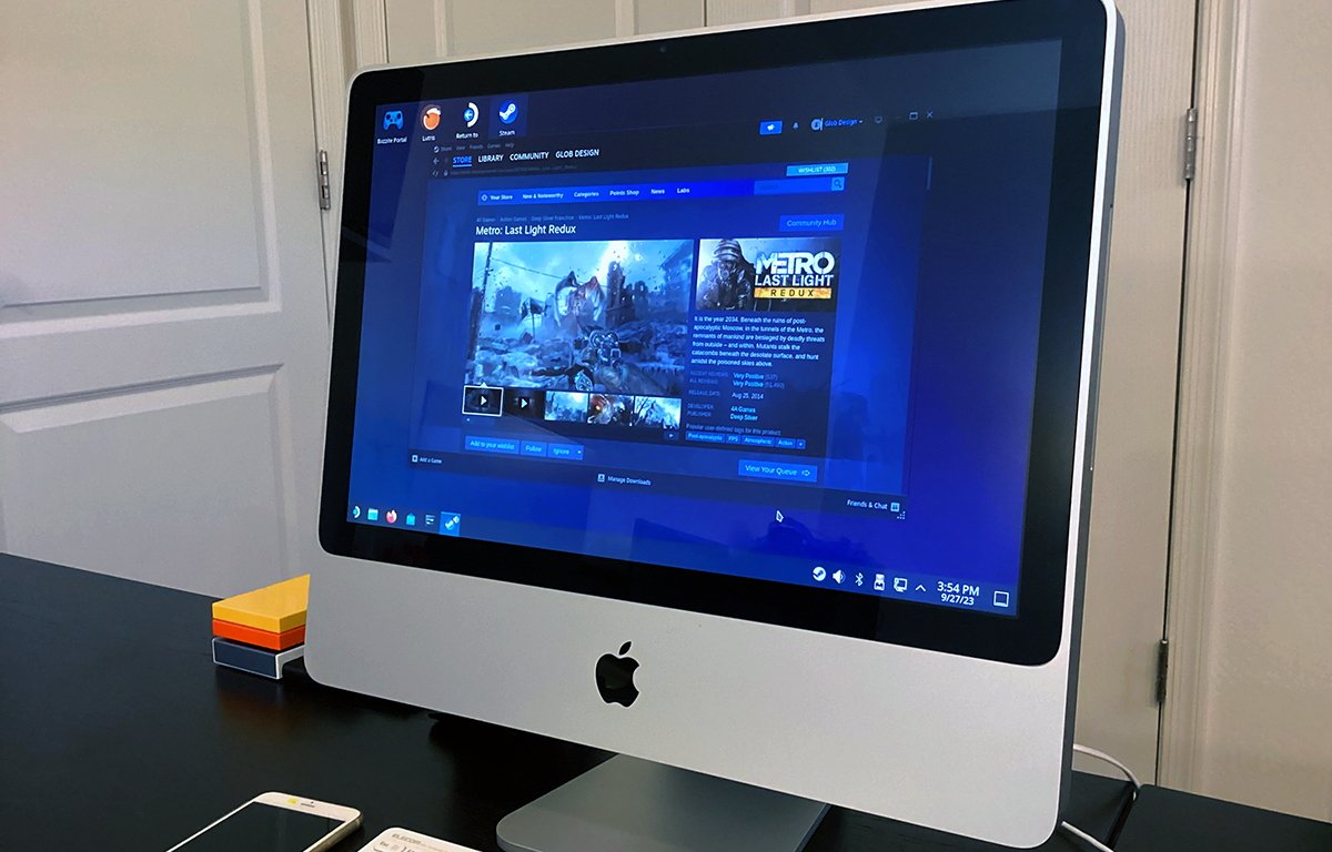 Bazzite a klient služby Steam spuštěné na počítači iMac z roku 2008.