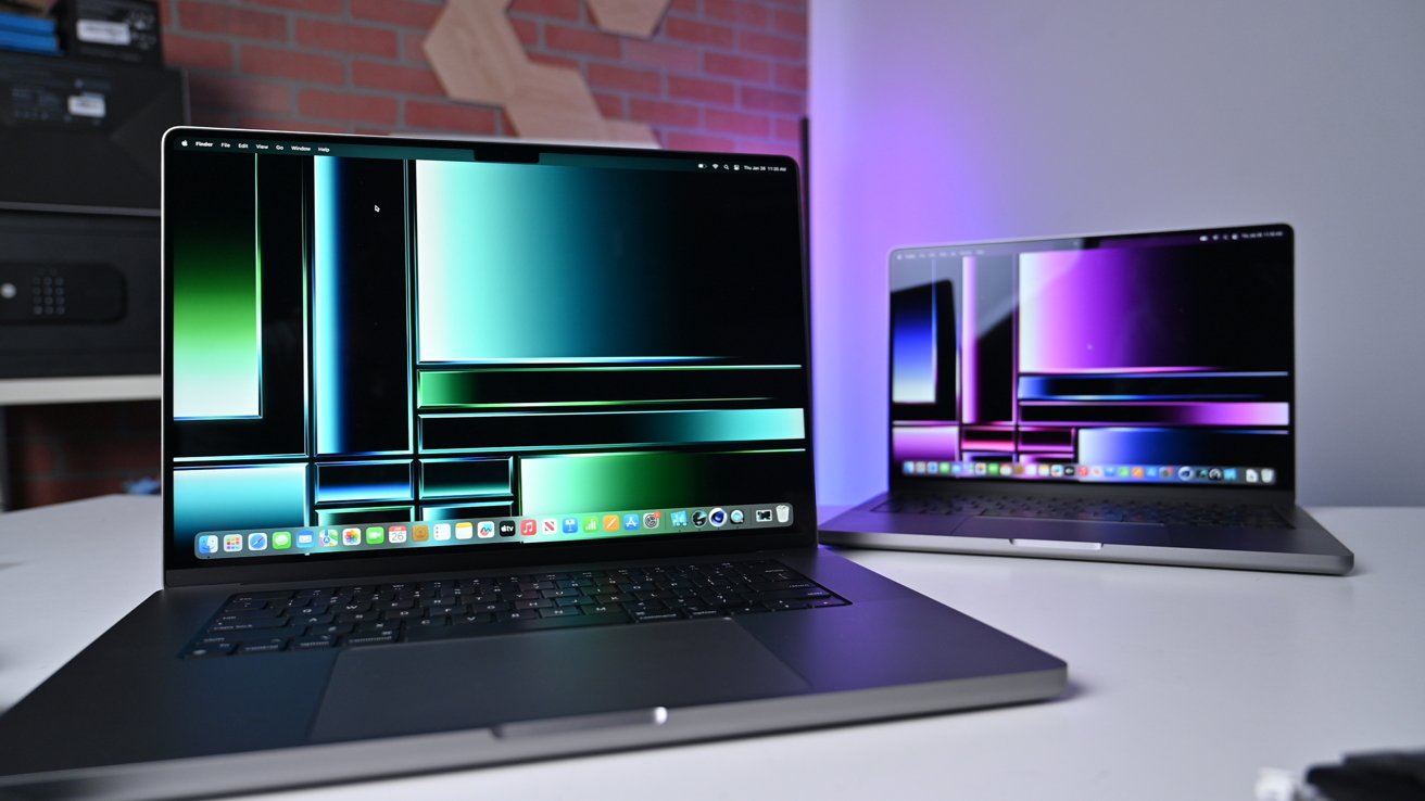 M2 MacBook Pro 16-inch and 14-inch laptops on desk