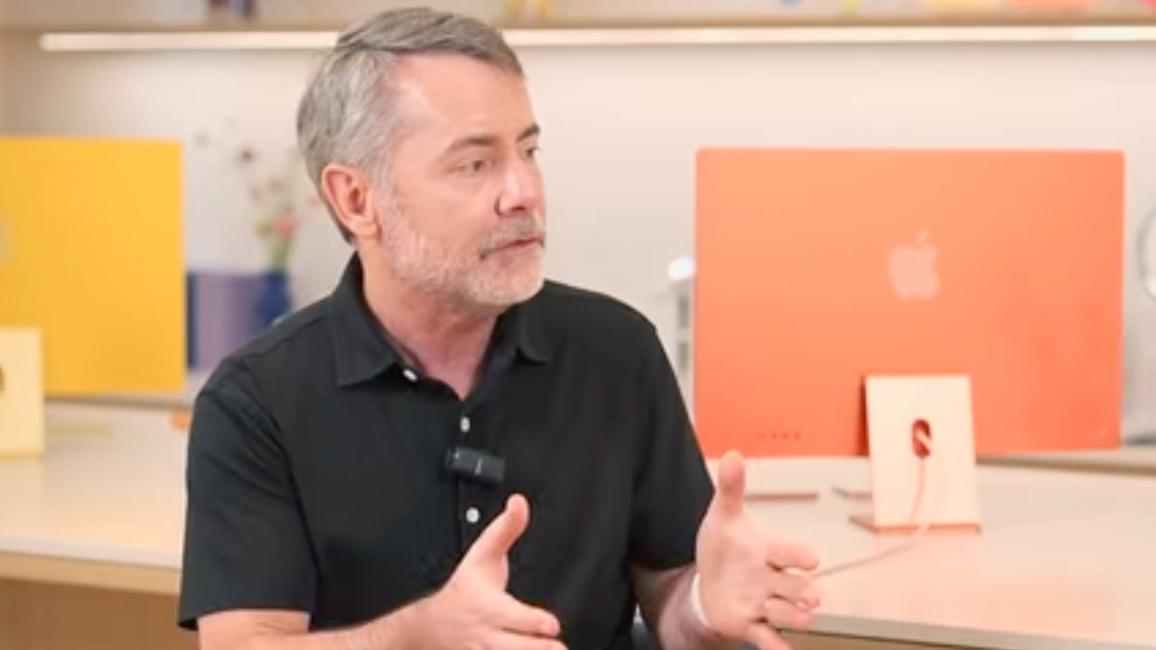 Bob Borchers in front of an iMac