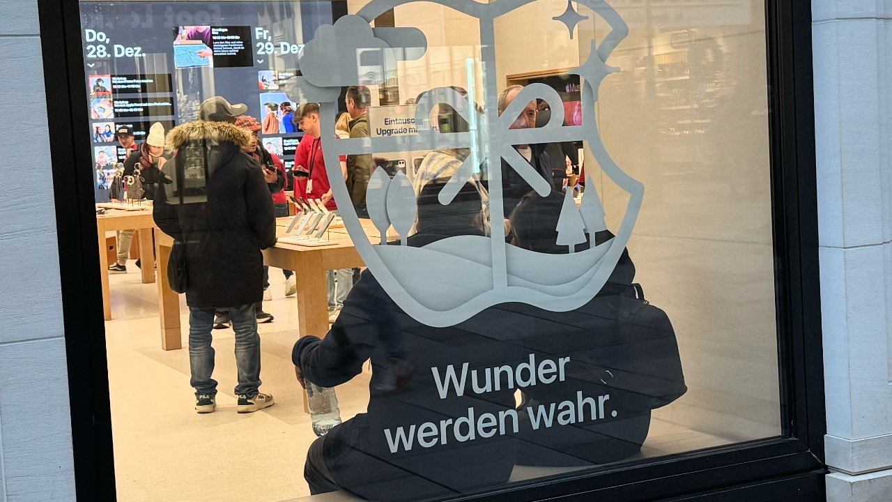 Apple Store window graphic depicting an anchor, people shopping inside, and text