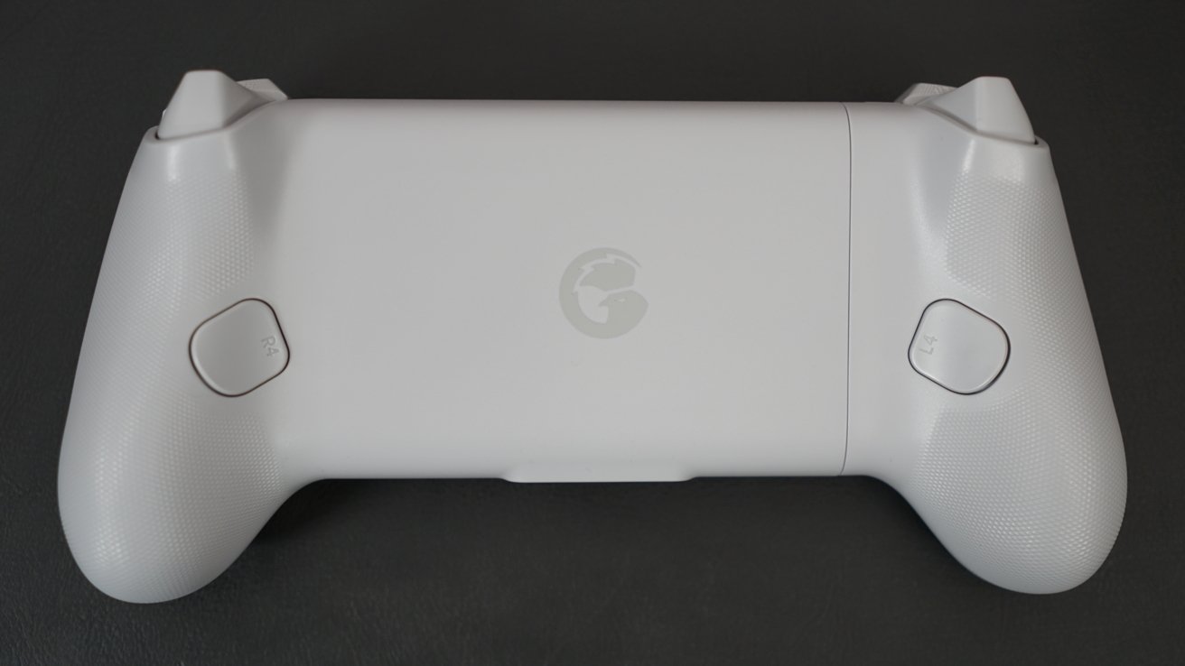 GameSir controller lays facedown with R4 and L4 extra programmable buttons visible.