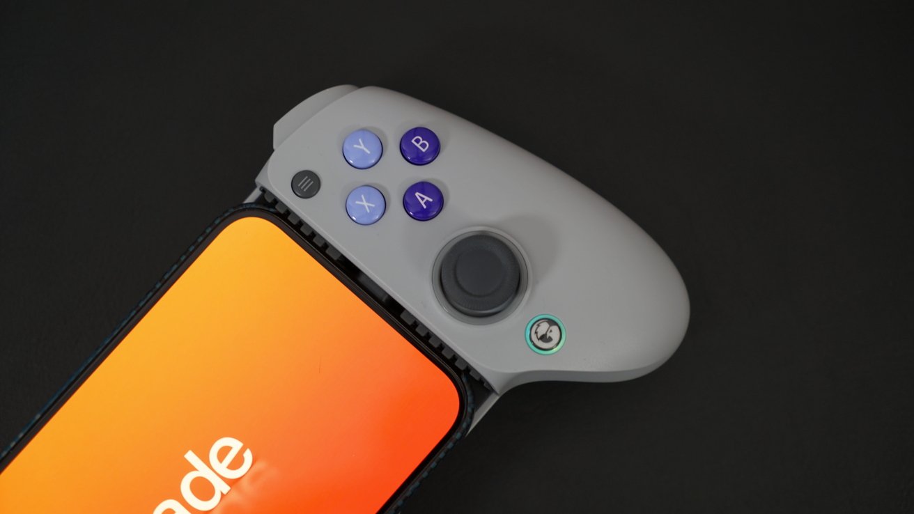 iPhone in GameSir controller with colorful buttons labeled Y, B, X, A, a directional joystick, and a logo button.