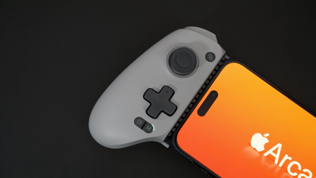iPhone in GameSir controller with a visible Apple Arcade logo. Directional buttons, a joystick, and other buttons are visible.