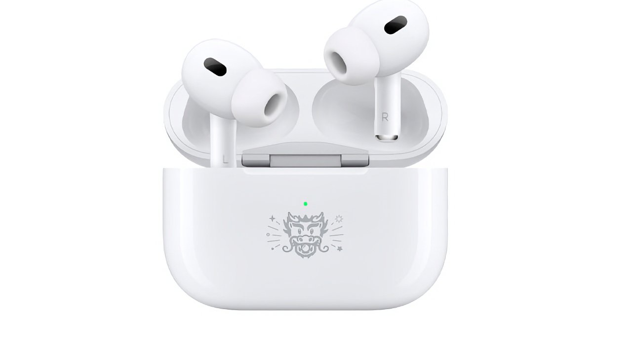 White wireless earbuds are resting in an open charging case with a decorative Year of the Dragon symbol on the front, set against a white background.