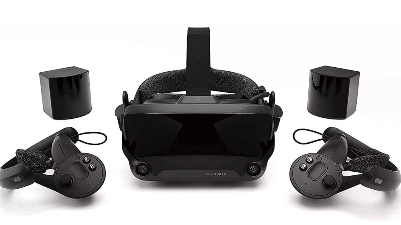 Valve Index headset with two handheld controllers and two sensor boxes, displayed against a white background, labeled 'Valve Index'.