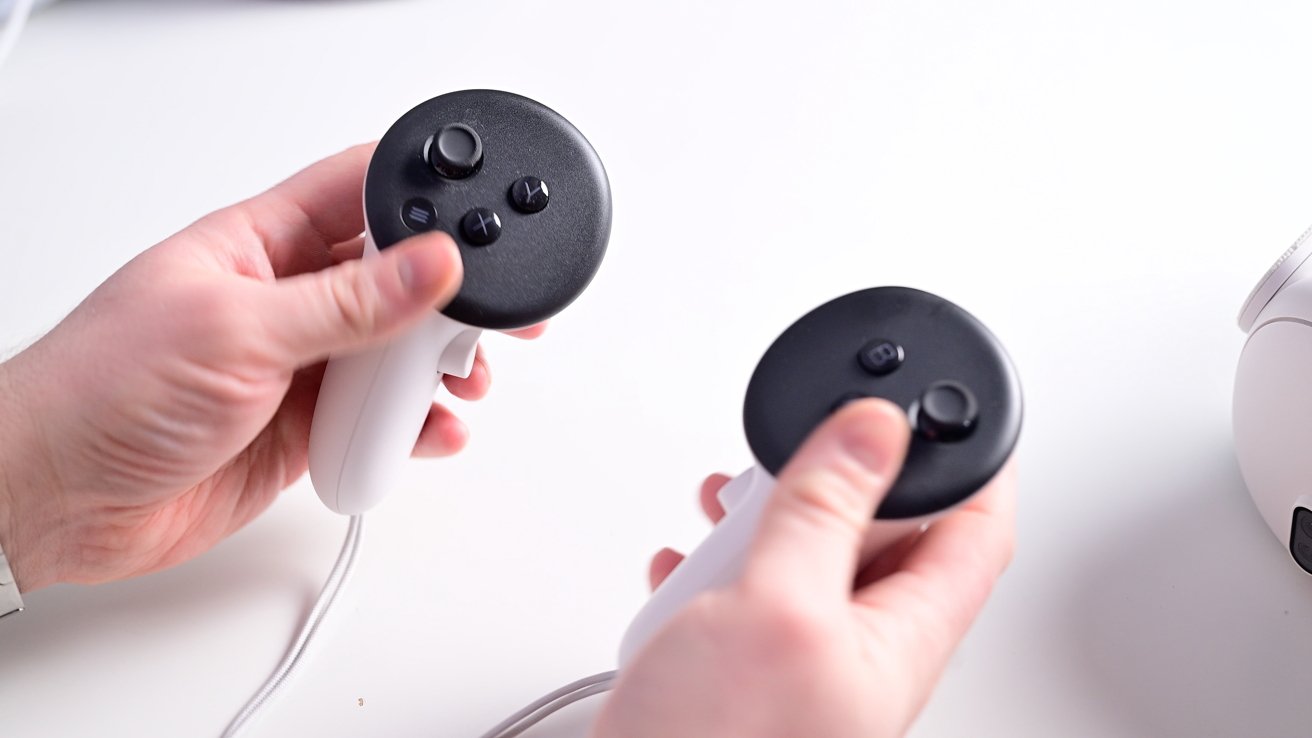 Holding the Meta Quest 3 motion controllers