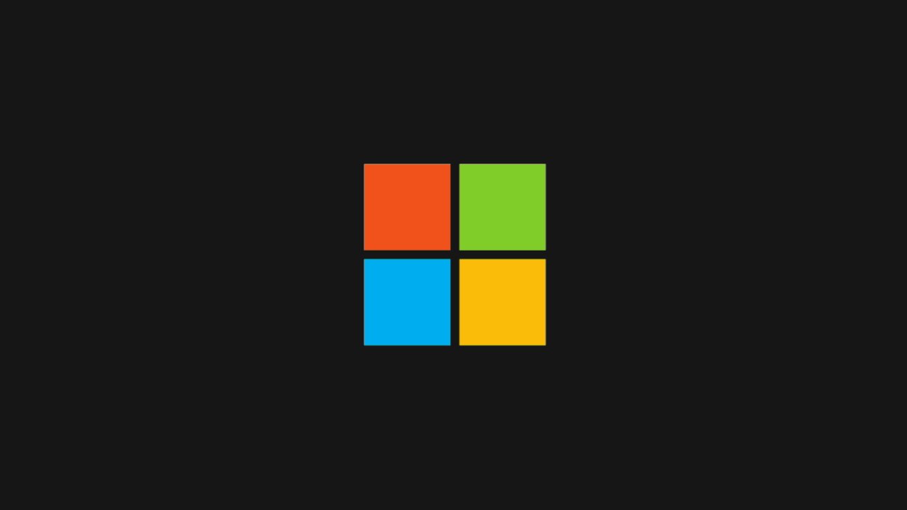 The Microsoft logo, which is a red, green, blue, and yellow set of squares, set against a black background
