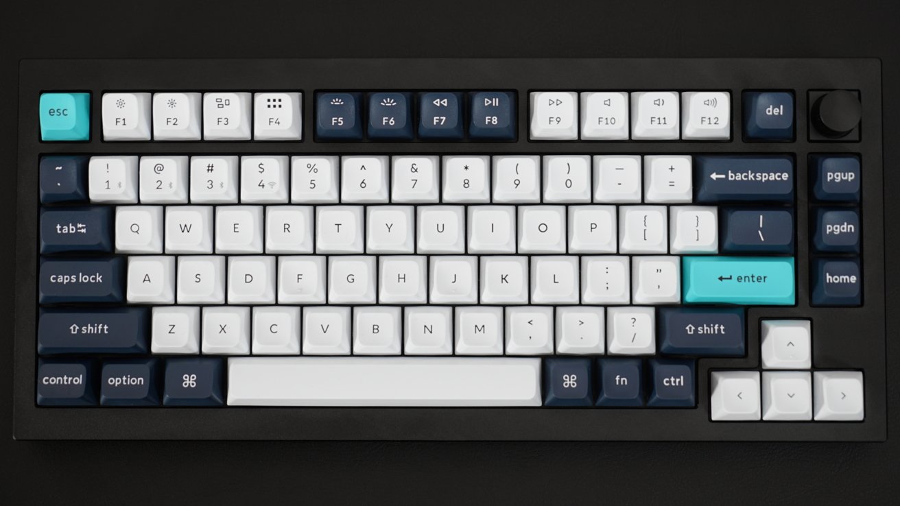 The Keychron Q1 Max mechanical keyboard with a black frame. The keys are white and blue.