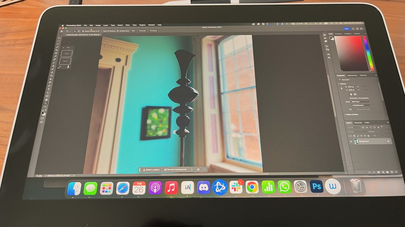 Wacom One 13 Touch displaying Adobe Photoshop interface with photo of a window and a dark silhouette of an object.