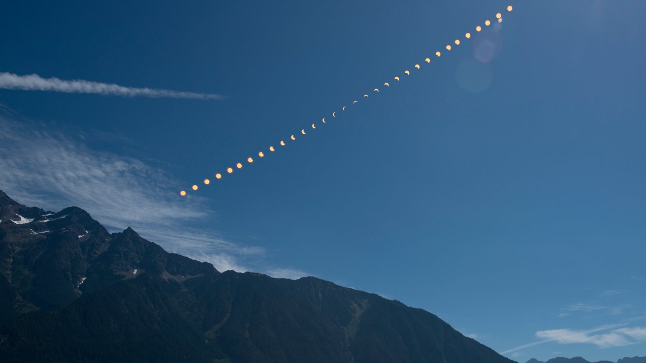 Sequence of solar eclipse phases over mountains under a clear blue sky.